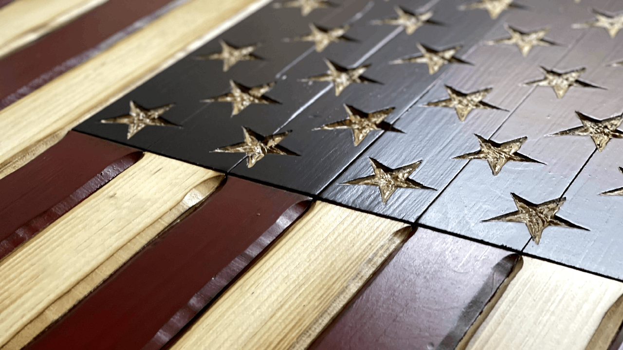 hand carved wooden American flags